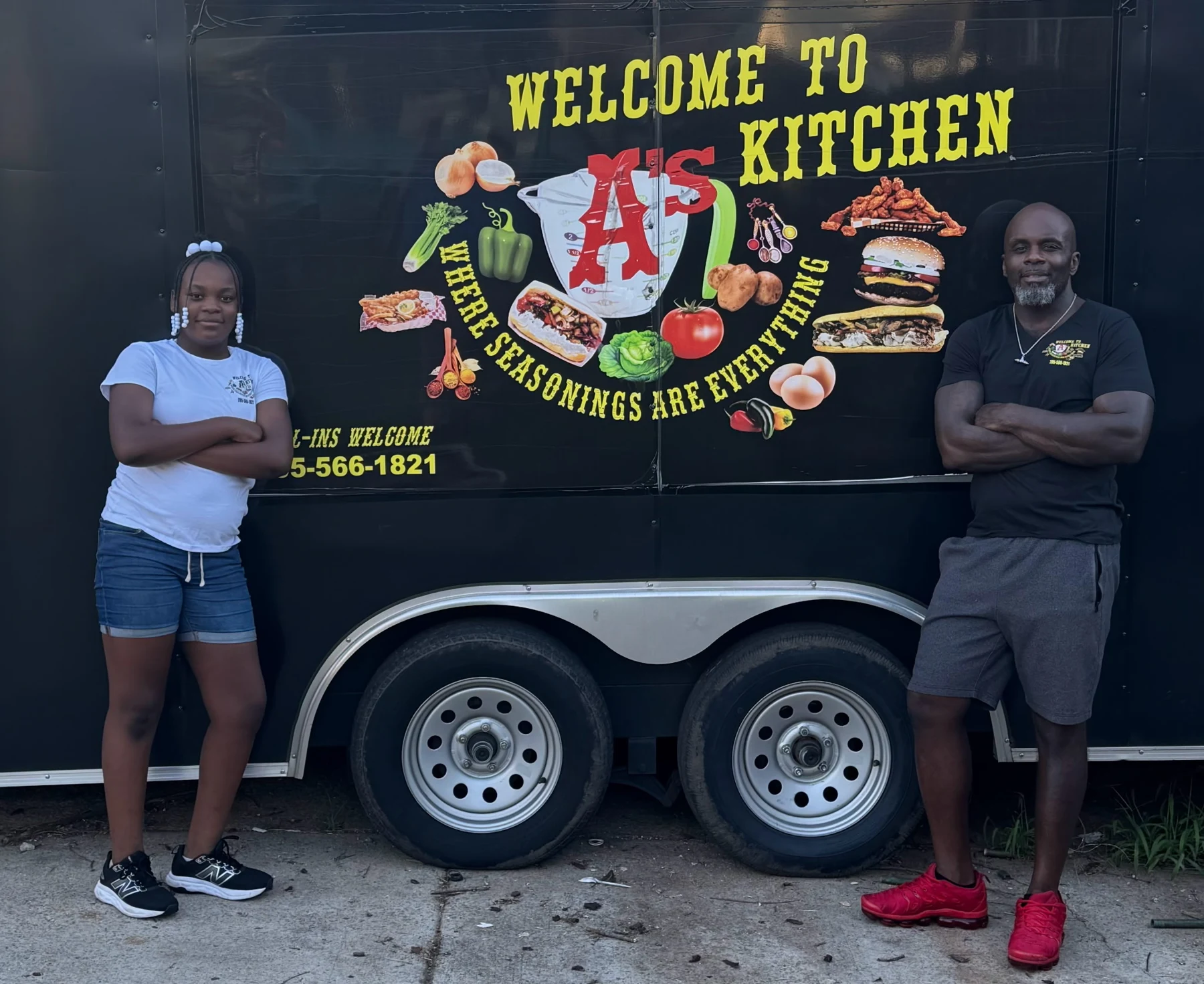 A's Kitchen family in front of the A's Kitchen food trailer